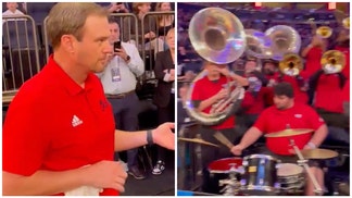 Tom Herman plays air guitar during FAU's Elite Eight win over Kansas State. (Credit: Screenshot/Twitter Video https://twitter.com/FAUAthletics/status/1639761724243935234)