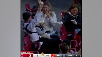 Reds Fan Catches Foul Ball While Holding Baby