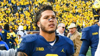 Michigan Wolverines running back Blake Corum is handing out turkeys for Thanksgiving. (Photo by Aaron J. Thornton/Getty Images)
