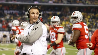 8328201-urban-meyer-ncaa-football-national-championship-ohio-state-vs-oregon.jpg