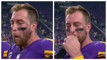 Vikings WR Adam Thielen spits out Thanksgiving turkey. (Credit: Screenshot/Twitter Video https://twitter.com/cjzero/status/1595998511929114625)