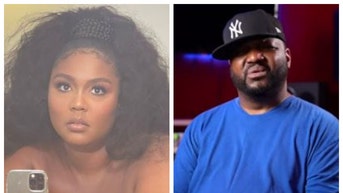 312632e9-Aries Spears-Lizzo