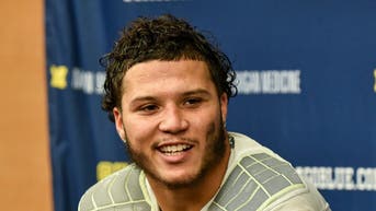 Will Michigan running back Blake Corum play against Ohio State? (Photo by Aaron J. Thornton/Getty Images)