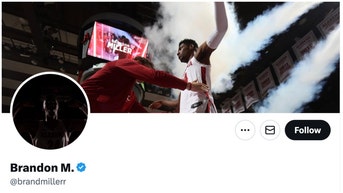 Alabama star Brandon Miller's Twitter features photo banner of him being frisked. (Credit: Twitter)