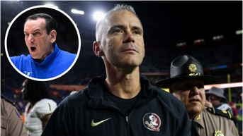Mike Krzyzewski isn't happy Florida State won't be in the College Football Playoff. He slammed the decision to put in Alabama. (Credit: Getty Images)