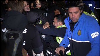An aggressive pro-Palestinian mob battled with police in Washington D.C. Wednesday night outside the headquarters of the DNC. (Credit: Getty Images)
