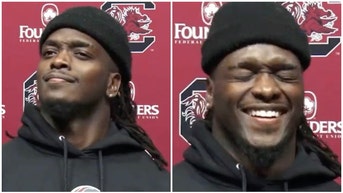 South Carolina receiver Dakereon Joyner loses it with laughter after asked poorly worded question about being a running back. (Credit: Screenshot/Twitter Video https://twitter.com/collyntaylor/status/1637894610868490244)