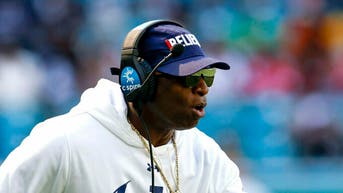 Will Arizona State hire Deion Sanders as the program's new football coach? (Photo by Don Juan Moore/Getty Images)