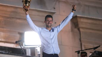 Novak-Djokovic-wimbledon-champion-trophy-ceremony