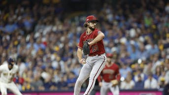 Arizona D-Backs RHP Zac Gallen delivers during the 1st inning vs. the Brewers during Game 2 of the 2023 NL Wild Card Series at American Family Field in Milwaukee, Wisconsin.