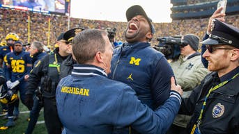 Michigan President Makes Public Plea For Help In Sherrone Moore Investigation, As 911 Audio Emerges