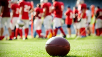 d4c3b57e-Close up on an american football ball