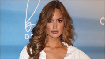 Model Haley Kalil pulled off a hall of fame Christmas move for her dad. She surprised him with Super Bowl tickets. (Credit: Getty Images)