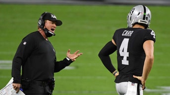 Jon Gruden and Derek Carr