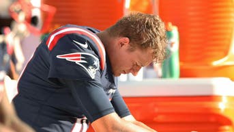 How will Mac Jones do in 2022? (Photo by Elsa/Getty Images)