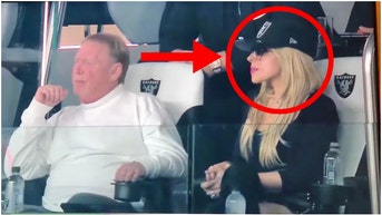 Raiders owner Mark Davis' female friend generated a bit of attention Monday night. She's been identified as Orianthi. (Credit: Screenshot/Twitter Video https://twitter.com/JordanDajani/status/1711551692783681875)