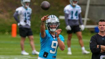CHARLOTTE, NC - MAY 13: Carolina Panthers Quarterback Matt Corral (9) throws the ball during day one of the Rookie Mini Camp on May 13, 2022 at the Carolina Panthers Practice Facility in Charlotte, NC. (Photo by David Jensen/Icon Sportswire via Getty Images)