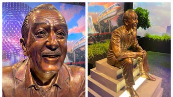 Walt Disney statue on toilet