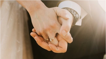 A couple on the internet is getting torched after the woman claimed she wanted a super expensive engagement ring. (Credit: Getty Images)