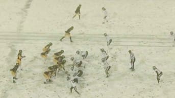 The Western Michigan Broncos beat CMU in a snow storm Wednesday night. (Credit: Screenshot/Twitter Video https://twitter.com/MACSports/status/1593052074954326016)