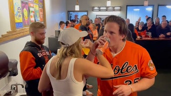 adley-rutschman-beer-orioles-chug