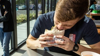 Dude housing a burrito