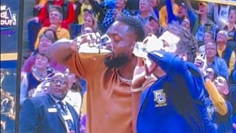 dwyane-wade-marquette-beer-chug