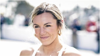Annie Agar continues to cook on Instagram. She posted photos showing off her tan lines while roasting TCU for losing to Colorado. (Credit: Getty Images)
