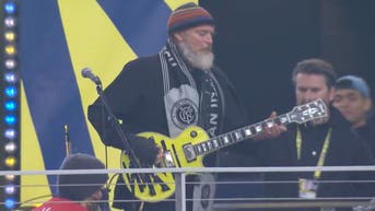 johnny-cash-son-nashville-soccer-club-man-in-black-mls-uniforms-guitar-solo