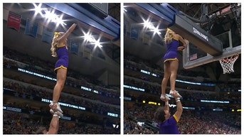 LSU cheerleader saves game.