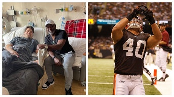 Peyton Hillis gets visit from Emmitt Smith.