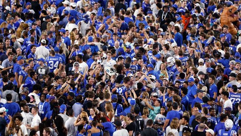 ESPN reporter Tom Luginbill is somewhere in the middle of this chaos, interviewing Duke head coach Mike Elko