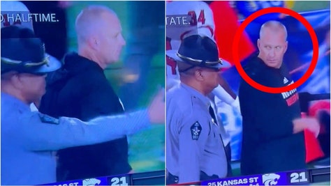 Dave Doeren isn't a big fan of being touched. He glared at a cop who touched him during the bowl game against Kansas State. (Credit: Screenshot/X Video https://twitter.com/bwizzbeats/status/1740529061175439539)