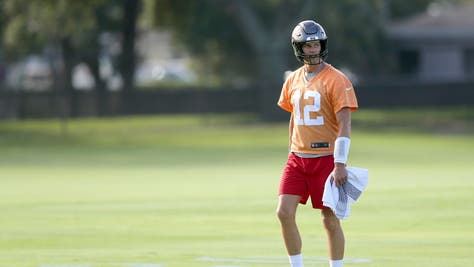 Tampa Bay Buccaneers quarterback Tom Brady (12) looks over towards the special teams drills during the Tampa Bay Buccaneers Training Camp on August 09, 2022 at the AdventHealth Training Center at One Buccaneer Place in Tampa, Florida.