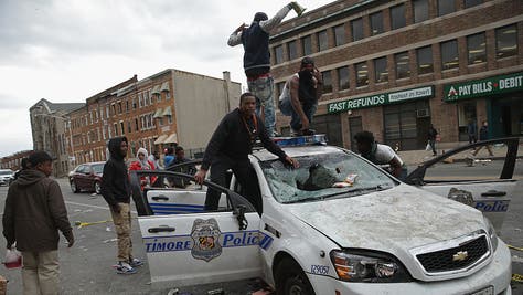 f47c1659-Protests in Baltimore After Funeral Held For Baltimore Man Who Died While In Police Custody