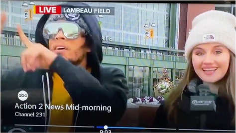 Green Bay Packers defensive back Jaire Alexander crashed a news broadcast and was mistaken for a fan. Watch the video. (Credit: Screenshot/X Video https://twitter.com/lambeau_nations/status/1744378472896647204)