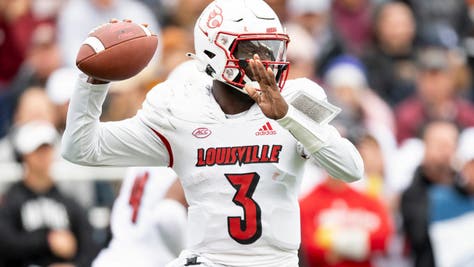 Louisville QB Malik Cunningham out against Virginia with "concussion-like symptoms." (Photo by Maddie Malhotra/Getty Images)