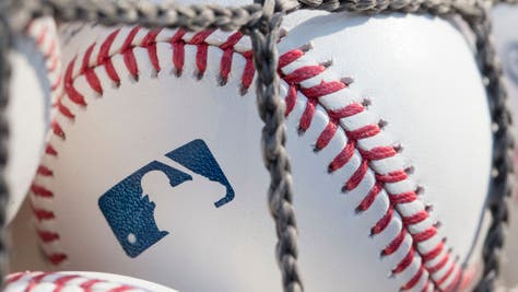 A baseball with MLB logo is seen at Citizens Bank Park before a game between the Washington Nationals and the Philadelphia Phillies.