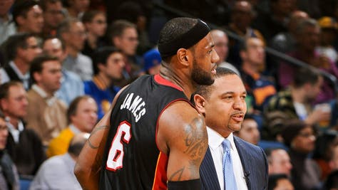 LeBron James next to Mark Jackson