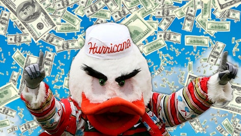 Hurricanes mascot surrounded by $100 bills