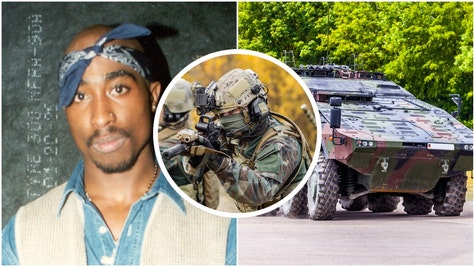 Las Vegas SWAT officers used armored vehicles to execute a search warrant in connection with Tupac Shakur's murder. (Credit: Getty Images)