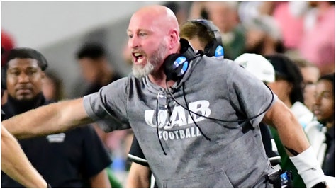 Trent Dilfer isn't pleased with the behavior he exhibited during a Saturday loss to Tulane. He said he regrets the situation. (Credit: Getty Images)