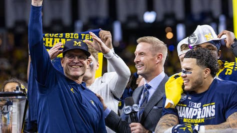 Michigan head coach Jim Harbaugh was not discussing any rumors about the NFL, as he prepares his team for Rose Bowl matchup with Alabama