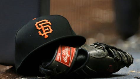 San Francisco Giants hat and glove.
