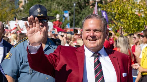 Arkansas head coach Sam Pittman enjoys a cold beer and Popeyes chicken on his perfect day