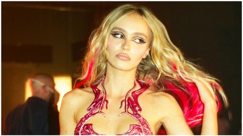 Lily-Rose Depp barely wears anything in promo photo for "The Idol." (Credit: HBO)