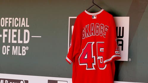 Tyler Skaggs jersey in dugout