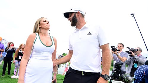 Team Captain Dustin Johnson of 4 Aces GC celebrates with wife Paulina Gretzky