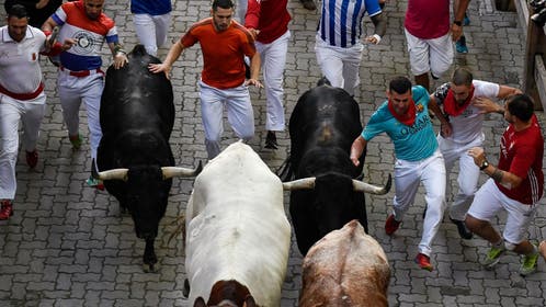 12773053-SPAIN-BULLFIGHTING-FESTIVAL-SAN FERMIN