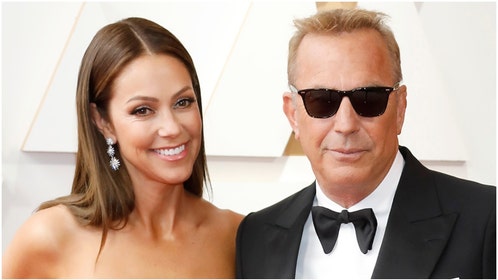 Kevin Costner's estranged wife Christine Baumgartner is vacationing in Hawaii with his friend. Their divorce has been messy. (Credit: Getty Images)